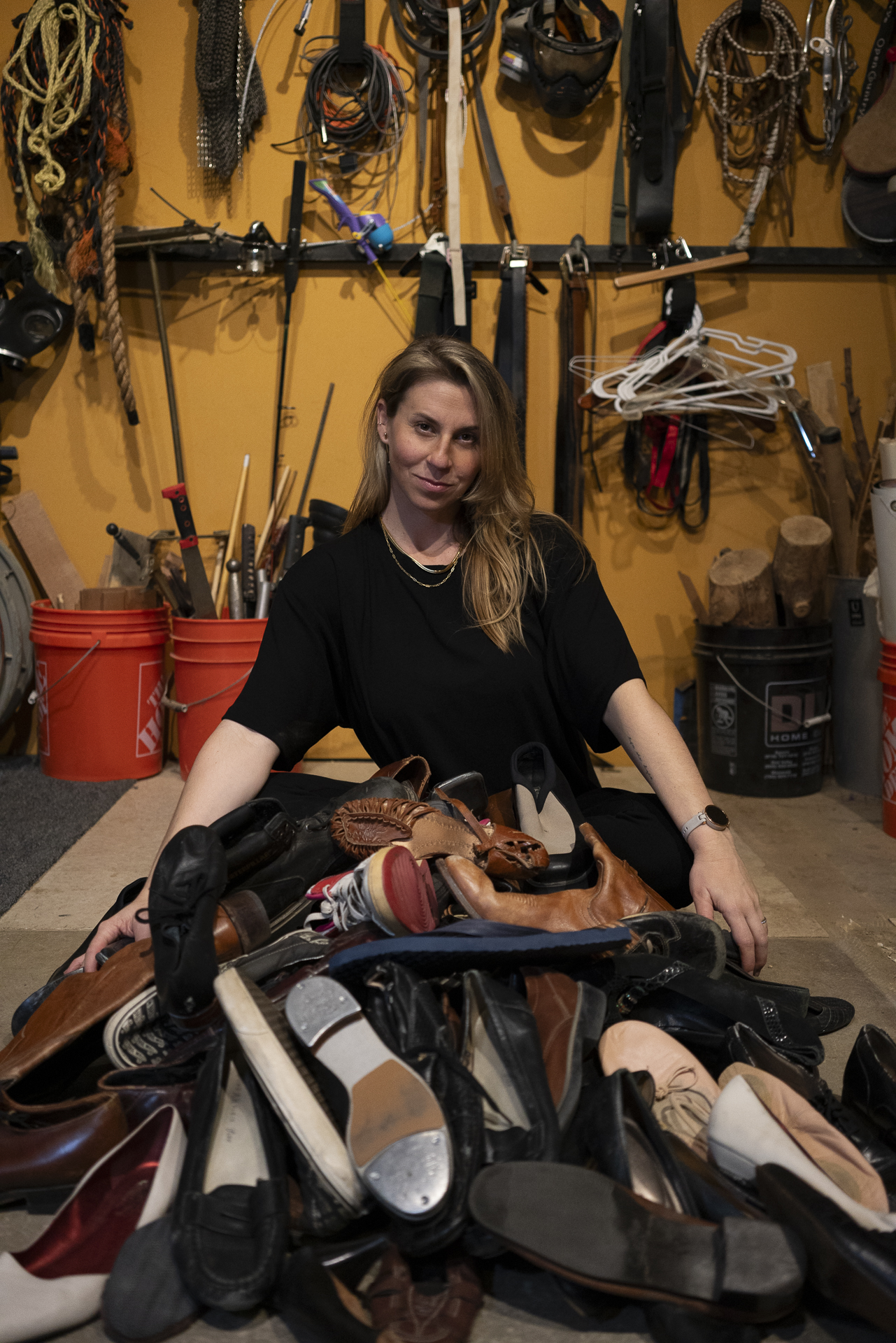 Tara Blume surrounded by props on the Foley stage