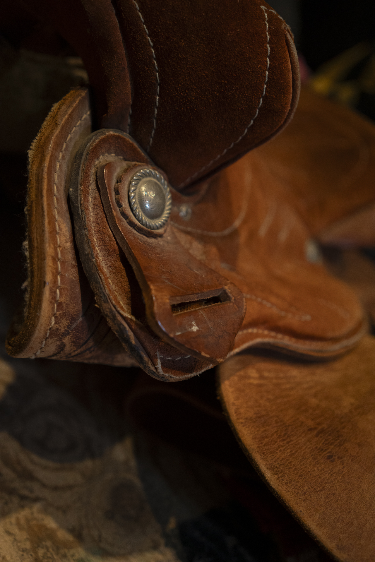 Leather saddle prop close-up on the Foley stage