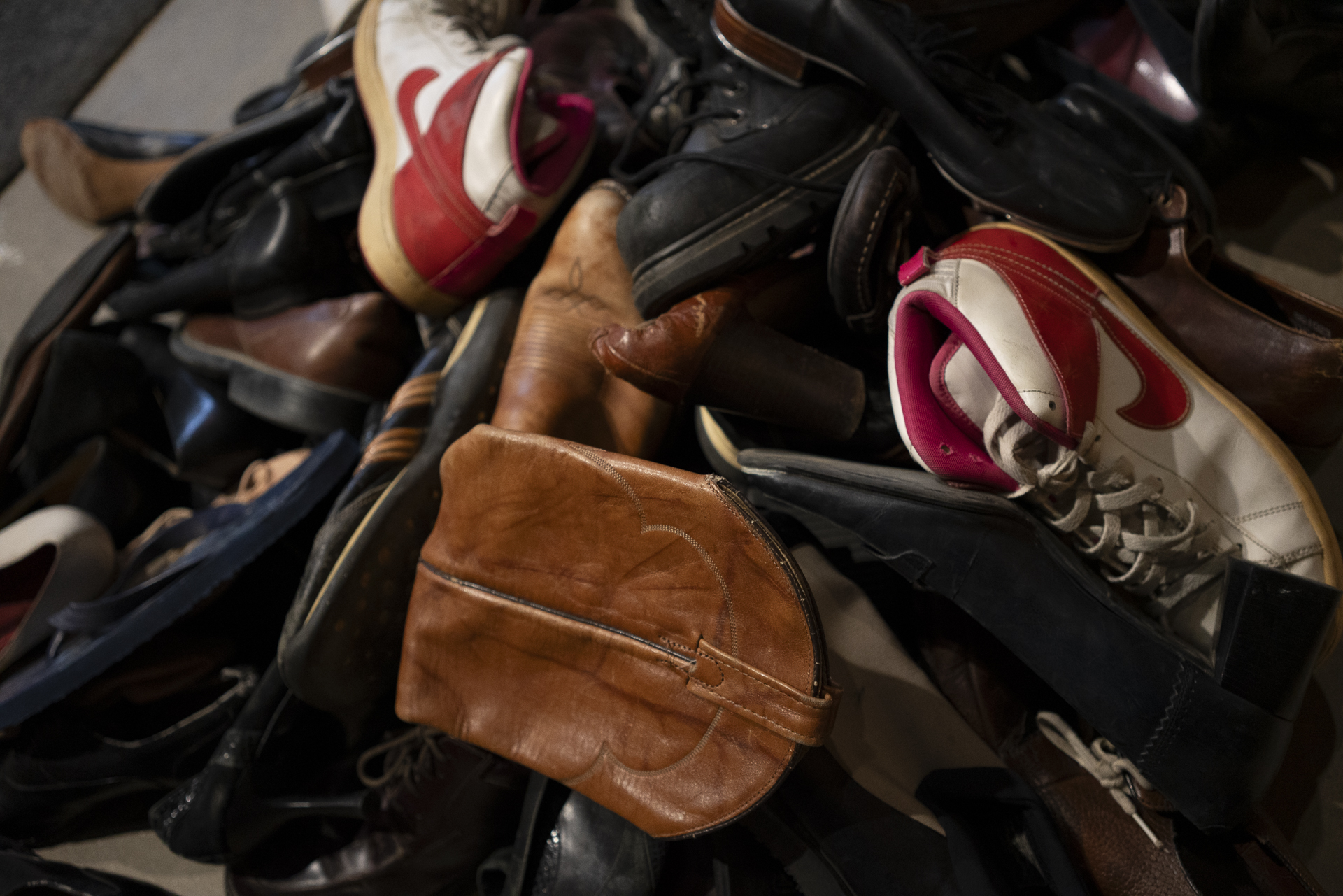 Pile of shoes and leather props ready for a cue