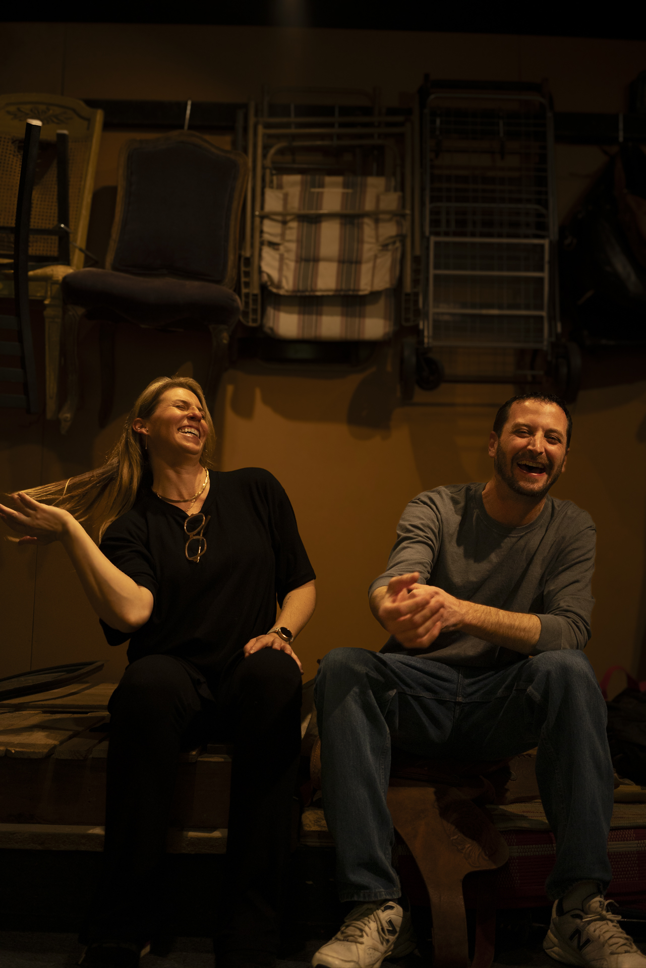 Foley artists talking through a cue sheet on the stage